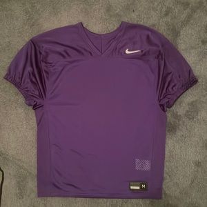 Dark purple football shirt by Nike. Size medium. Never worn.